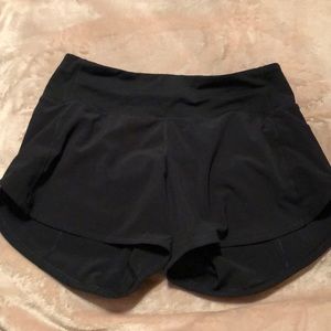 Black size 4 Tall Lululemon athletic shorts